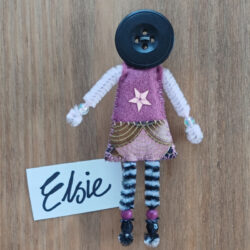 doll brooch